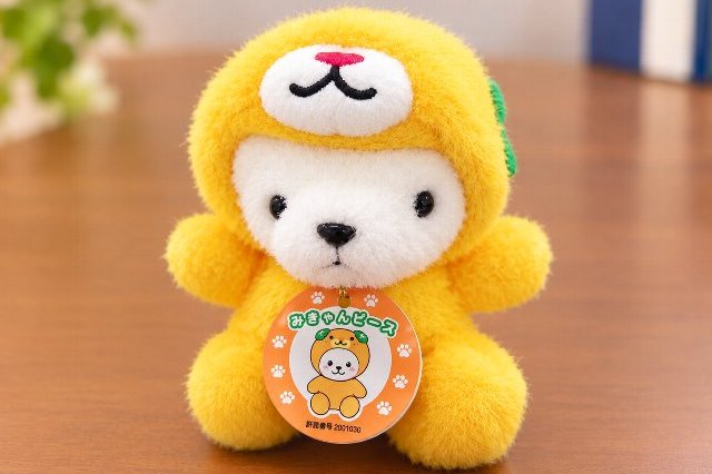 黄色い着ぐるみのふわふわマスコット.jpg